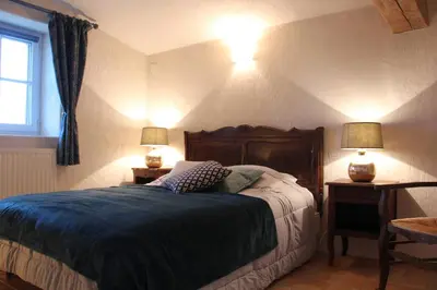 Un ou plusieurs lits dans un hébergement de l'établissement Les chambres d'hôtes de La Métairie du Bourg
