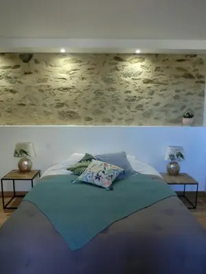 Un ou plusieurs lits dans un hébergement de l'établissement Les chambres d'hôtes de La Métairie du Bourg