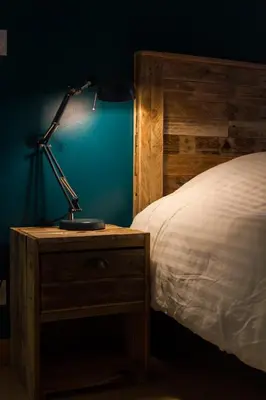 Un ou plusieurs lits dans un hébergement de l'établissement Le Puy Carmin - Chambre d'hôtes avec jacuzzi