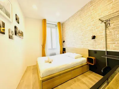 Un ou plusieurs lits dans un hébergement de l'établissement Loft NYC - Hyper centre