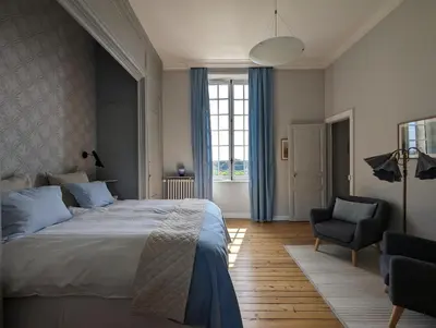 Un ou plusieurs lits dans un hébergement de l'établissement Château Haute Roche