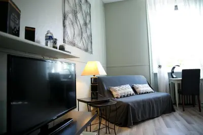 Télévision ou salle de divertissement dans l'établissement Logis Auberge De L'ombrée
