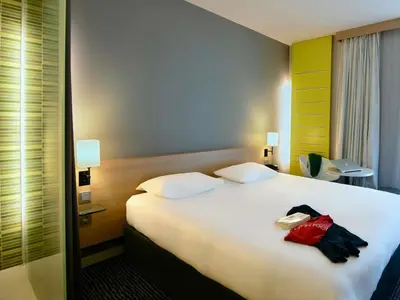 Un ou plusieurs lits dans un hébergement de l'établissement ibis Styles Nantes Reze Aéroport