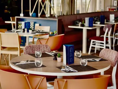 Restaurant ou autre lieu de restauration dans l'établissement ibis Styles Nantes Reze Aéroport