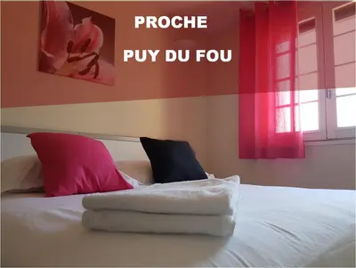 Un ou plusieurs lits dans un hébergement de l'établissement Hôtel Le Sainte Florence