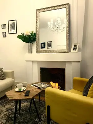 Coin salon dans l'établissement Magnifiques Appartements Hyper Centre