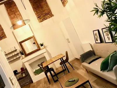 Coin salon dans l'établissement Magnifiques Appartements Hyper Centre