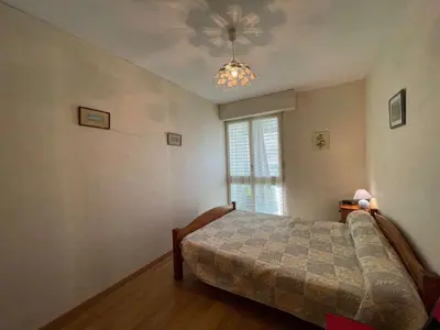 Un ou plusieurs lits dans un hébergement de l'établissement Appartement 2 pièces proche mer avec loggia - Saint-Hilaire-de-Riez - FR-1-224C-625