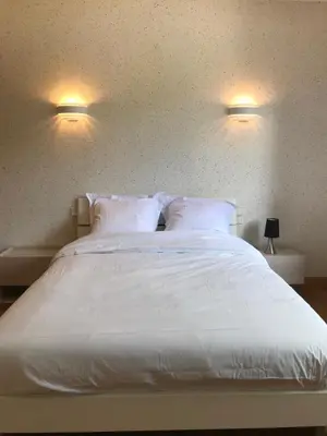 Un ou plusieurs lits dans un hébergement de l'établissement Villa du Bois Verts