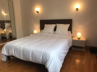 Un ou plusieurs lits dans un hébergement de l'établissement Villa du Bois Verts