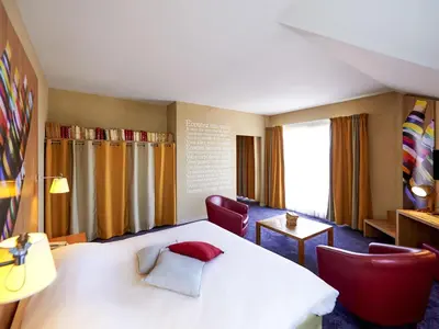Un ou plusieurs lits dans un hébergement de l'établissement ibis Styles Cholet