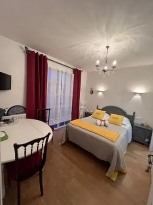 Un ou plusieurs lits dans un hébergement de l'établissement Chambres d'hôtes La Rose Des Sables