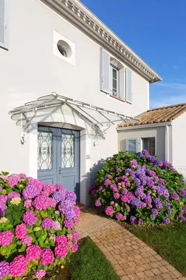 Jardin de l'établissement Madame Vacances Les Villas de Fontenelles