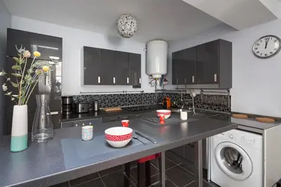Cuisine ou kitchenette dans l'établissement L'Atelier Nantais by Cocoonr