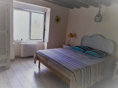 Un ou plusieurs lits dans un hébergement de l'établissement Vendrennes Chez Florymarysol