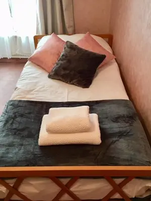Un ou plusieurs lits dans un hébergement de l'établissement La Maison du Bonheur - Grande maison de vacances classée 4 étoiles