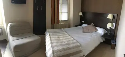Un ou plusieurs lits dans un hébergement de l'établissement Le Relais