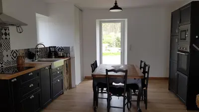Cuisine ou kitchenette dans l'établissement Gîte 