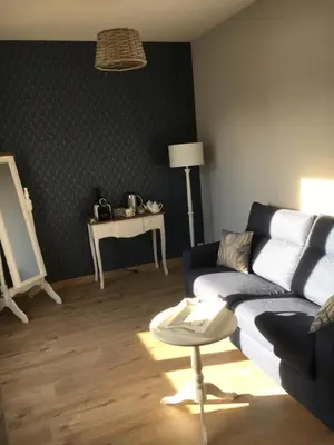 Coin salon dans l'établissement La Demeure d'Alexandra
