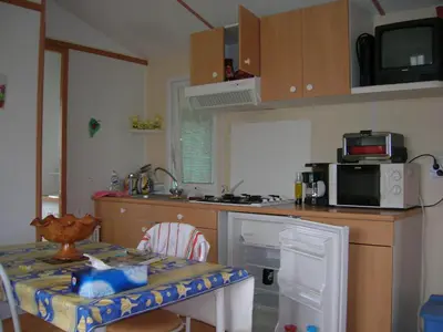 Cuisine ou kitchenette dans l'établissement Location à 15 kms du Puy du Fou