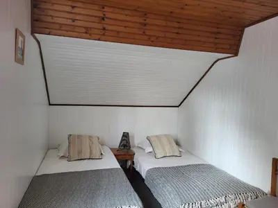 Un ou plusieurs lits dans un hébergement de l'établissement Charmante villa à 500m de la plage, calme et tout confort - FR-1-364-57