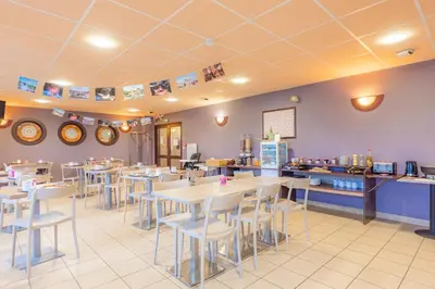 Restaurant ou autre lieu de restauration dans l'établissement Appart'City Classic La Roche sur Yon Centre