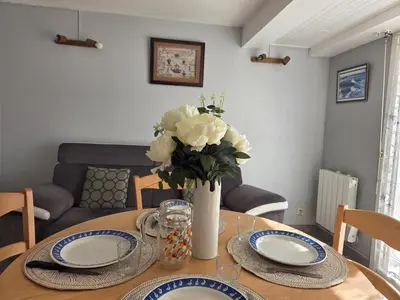 Coin salon dans l'établissement Confortable duplex avec terrasse, proche plage et commerces - St Brevin l'Océan - FR-1-364-43