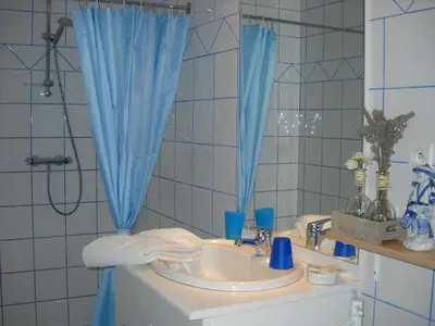 Salle de bains dans l'établissement Domaine de la Cour