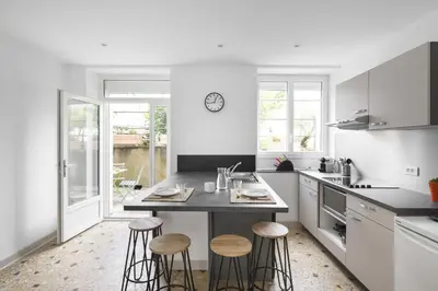 Cuisine ou kitchenette dans l'établissement Mosaik by Cocoonr