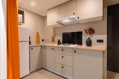 Cuisine ou kitchenette dans l'établissement Camping OAKi