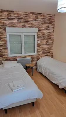 Un ou plusieurs lits dans un hébergement de l'établissement Mauleon Maison prive jardin 6 personnes