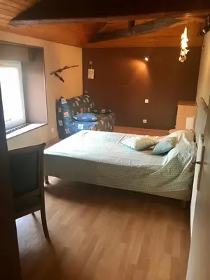 Un ou plusieurs lits dans un hébergement de l'établissement Gîte la Treille