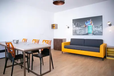 Coin salon dans l'établissement Appart-Hotel Mer & Golf City Ile de Nantes