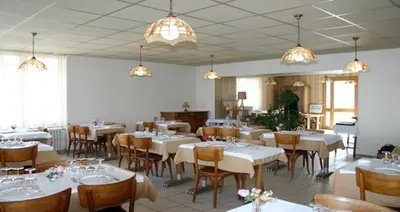 Restaurant ou autre lieu de restauration dans l'établissement Hôtel du Marché
