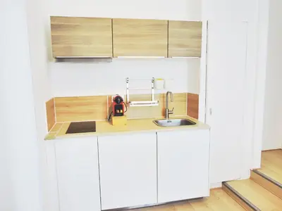 Cuisine ou kitchenette dans l'établissement F2 Golden Lounge, Hyper Centre, Parking