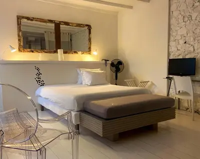 Un ou plusieurs lits dans un hébergement de l'établissement Hotel de Charme Le Sud Bretagne