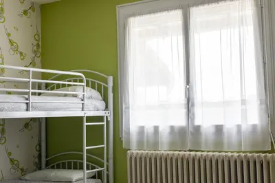 Un ou plusieurs lits dans un hébergement de l'établissement Hotel Le Cormier 9