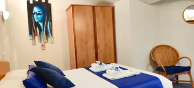 Un ou plusieurs lits dans un hébergement de l'établissement Hotel La Bosselle