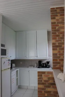 Cuisine ou kitchenette dans l'établissement GITE AVEC SPA ENTRE FORET ET PLAGE - Ambiance Bord de Mer