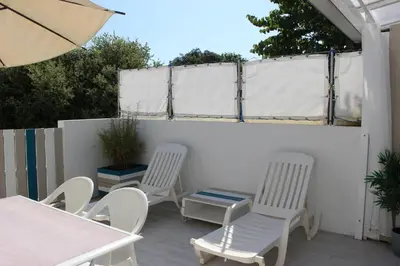 Balcon ou terrasse dans l'établissement GITE AVEC SPA ENTRE FORET ET PLAGE - Ambiance Bord de Mer