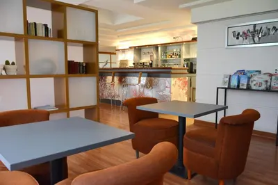 Coin salon dans l'établissement Hôtel du Parc Nantes Ouest Orvault