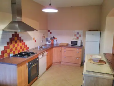 Cuisine ou kitchenette dans l'établissement le coing