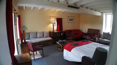 Coin salon dans l'établissement Le Beugnon