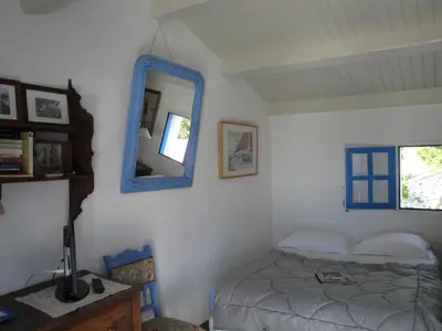 Un ou plusieurs lits dans un hébergement de l'établissement Le Buzet Bleu Bed & Breakfast