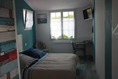 Un ou plusieurs lits dans un hébergement de l'établissement KARABI