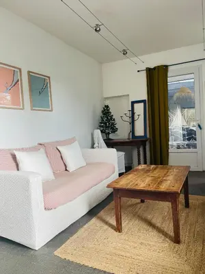 Coin salon dans l'établissement Charmante maison entre Marché et Tourelles