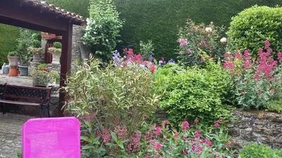 Jardin de l'établissement L' Esterlanges SUITE FAMILLE 2 chambres 4 personnes PROCHE PUYduFOU