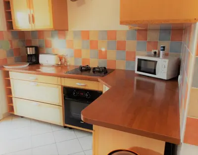 Cuisine ou kitchenette dans l'établissement Camping Insolite Le Haut Village