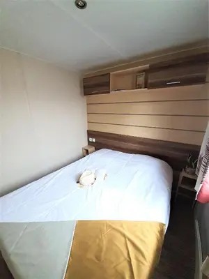 Un ou plusieurs lits dans un hébergement de l'établissement Camping la Prairie