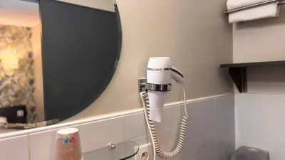Salle de bains dans l'établissement Hotel Restaurant L'Atlantique